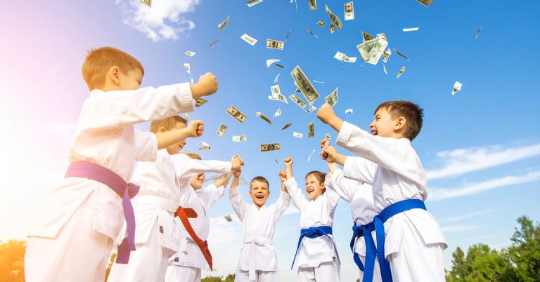 raining money on kids