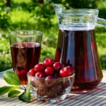 Cherry Juice In A Glass And Carafe