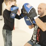 siyar-teaching-boy-to-punch